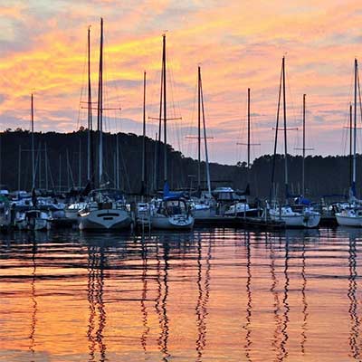Sailboats docked at Steele Creek Marina on Kerr Lake